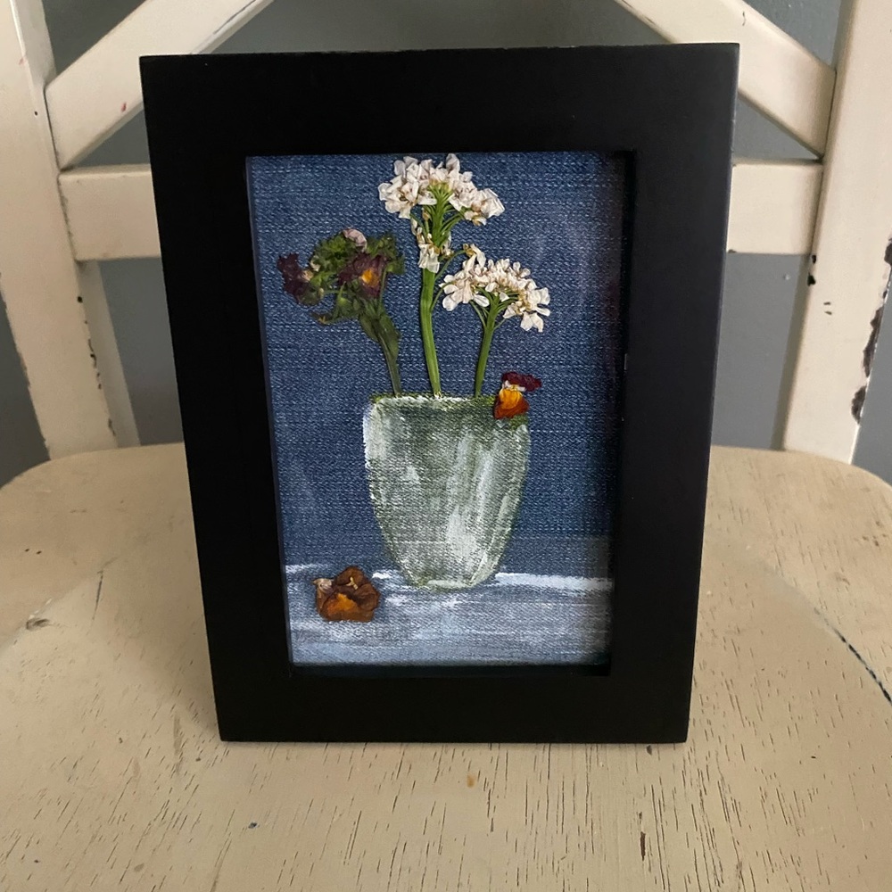 Adorable floral art piece.